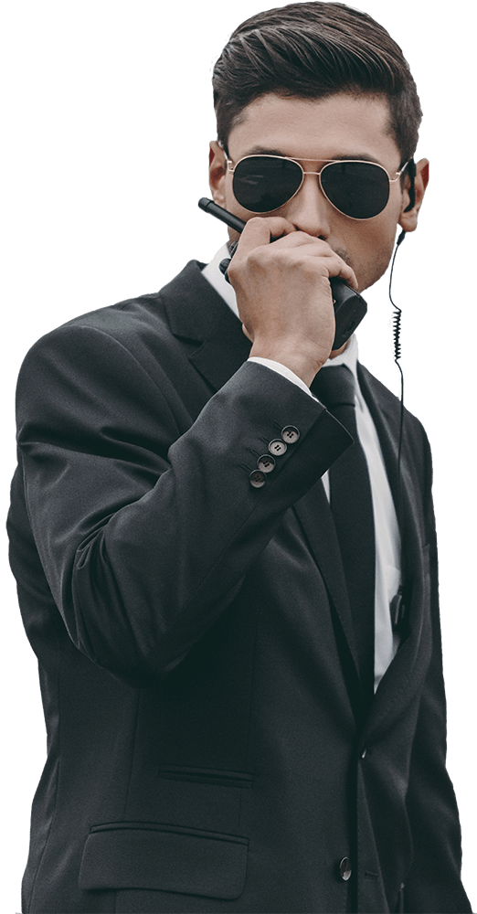 handsome bodyguard in sunglasses talking by portab 2022 12 16 16 34 29 utc